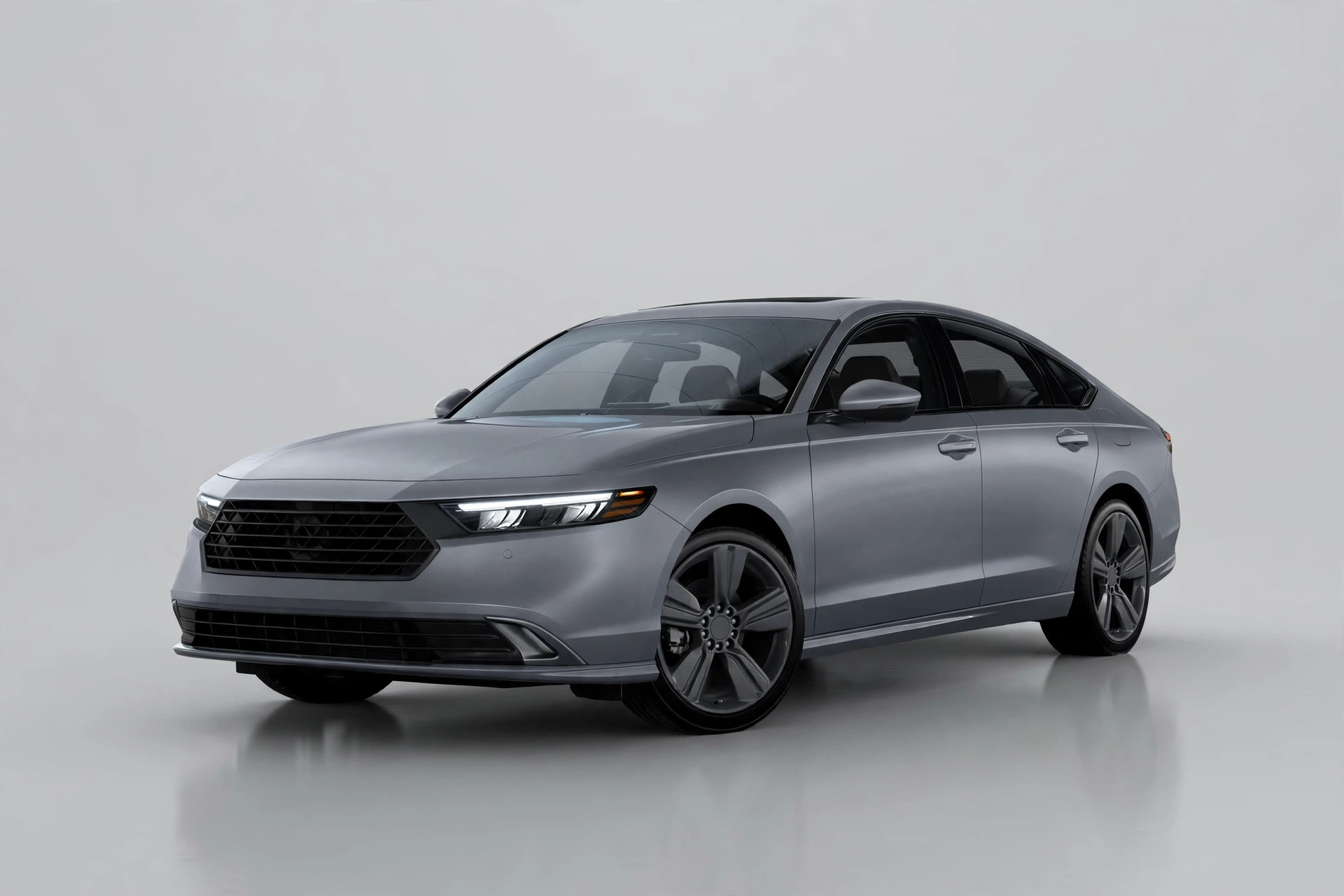 Grey Honda Accord midsize sedan in a studio, front three-quarter view