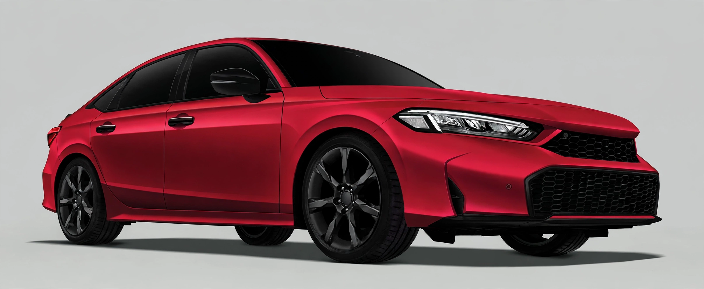 Red Honda Civic compact sedan in a studio, front three-quarter view