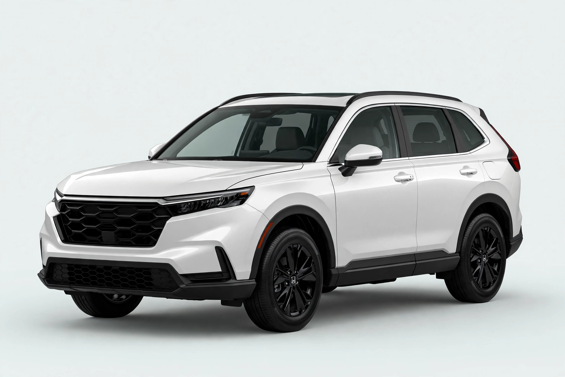 White Honda CR-V compact SUV in a studio, front three-quarter view